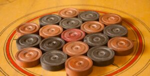 carrom, karrom, table game, game, pieces, coins, orange table, orange gaming, orange game, orange games, carrom, carrom, carrom, carrom, carrom